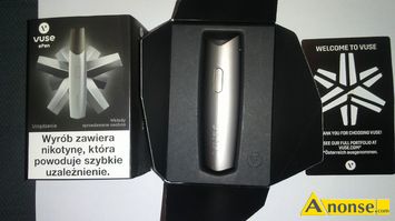 Anonse E-PAPIEROS, WUSE, NOWA JAKO PALENIA. RӯNE WKADY SMAKOWE. MNIEJ SUBSTANCJI TOKSYCZNYCH. ADOWANIE Z ZASILACZA KOMRKI. 4 MIESICE GWARANC