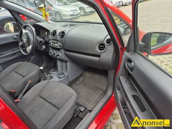 Anonse MITSUBISHI COLT, 2011r., 1.300cm<sup>3</sup>, benzyna + gaz sekwencyjny, van, 242.000km, czerwony, ABS, autoalarm, centralny zamek, elektryczne lusterk