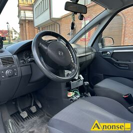 Anonse OPEL MERIVA, 2004r., 1.600cm<sup>3</sup>, 77KM, benzyna, 207.500km, srebrny, metalik, poduszki powietrzne, 4xPP, immobiliser, ABS, wspomaganie kierowni