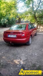 Anonse AUDI A4, 1998r., 1.598cm<sup>3</sup>, 101KM, benzyna, sedan, 221.152km, czerwony, metalik, poduszki powietrzne, 2xPP, elektryczne szyby przd (2xES), l