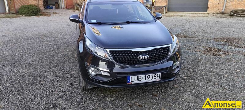 KIA  SPORTAGE, 2014r., 1.600cm<sup>3</sup>, 135KM , benzyna, 73.473km, czarny bezpieczestwo: system kontroli trakcji, autoalarm, immobiliser, ABS komfort: elektryczne szyby, wspomaganie kierownicy, regulacja wiate, elektryczne lusterka, klimatyzacja automatyczna, regulacja kierownicy, komputer pokadowy, centralny zamek wygld: aluminiowe felgi informacje dodatkowe: z salonu, ksika serwisowa, serwisowany, bezwypadkowy, karta pojazdu, 1.waciciel audio samochodowe: radio + odtwarzacz CD opis dodatkowy: Kia Sportage wersja L czujniki parkowania przd i ty kamera cofania komplet k z oponami zimowymi elektryczne skadane lusterka i elektryczne szyby przyciemnianie szyby ty klimatyzacja faktura VAT cena 54000 brutto do uzgodnienia  stan przedmiotu transakcji: stan bardzo dobry - image 5