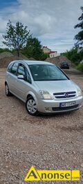Anonse OPEL MERIVA, 2004r., 1.600cm<sup>3</sup>, 77KM, benzyna, 210.077km, srebrny, metalik, poduszki powietrzne, 4xPP, immobiliser, ABS, wspomaganie kierowni