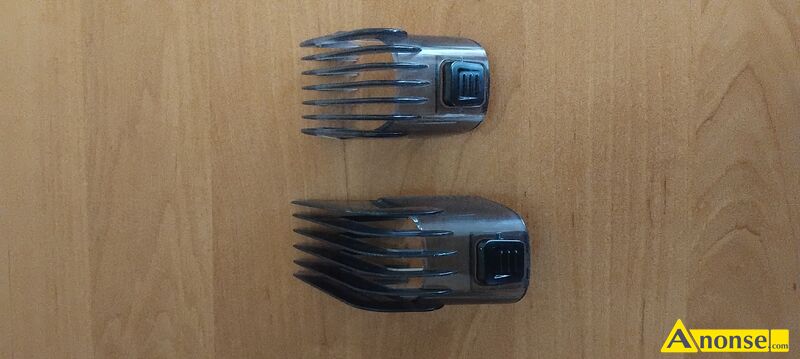 SPRZEDAM  ORYGINALNE NAK�ADKI GRZEBIENIOWE DO MASZYNEK DO STRZY�ENIA REMINGTON - IDEALNE DLA TWOJEGO STYLU W opakowaniu znajduj� si� 2 sztuki nak�adek grzebieniowych, co pozwala na jeszcze wi�ksz� r�norodno�� i dopasowanie do Twoich indywidualnych potrzeb. Niezale�nie od tego, czy chcesz osi�gn�� kr�tkie i zgrabne fryzury, czy te� preferujesz d�u�sze pasma w�os�w, te nak�adki zapewni� Ci odpowiednie narz�dzia do osi�gni�cia wymarzonego efektu. Postaw na oryginalne nak�adki grzebieniowe Remington i ciesz si� profesjonalnymi rezultatami stylizacji w wygodny i prosty spos�b. Cechy Kompatybilno�� HC5150 / HC5350 / HC5355 / HC5550 / HC5750 Mniejsza nak�adka 3, 6, 9, 12, 15, 18 i 21 mm Wi�ksza nak�adka 24, 27, 30, 33, 36, 39 i 42 mm Ilo�� nasadek w zestawie 2 Odbi�r osobisty nie wysy�am wysy�k�.Kontakt tel. lub sms'a.Rzadko odbieram tel.Polecam. stan przedmiotu transakcji: stan bardzo dobry - image 1